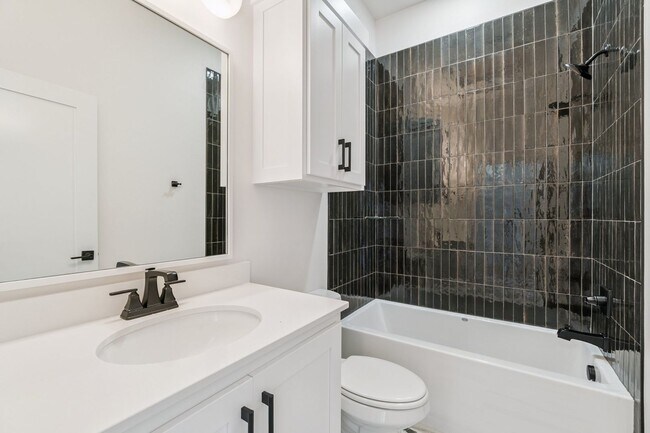 Building Photo - Minimalist Magic: 2-Bed Apartment Over Sel...