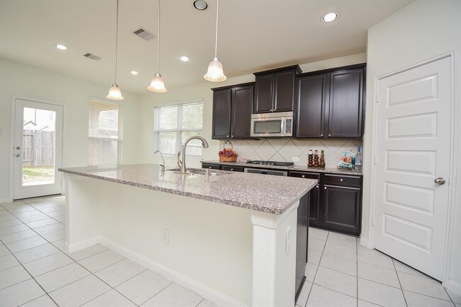 Building Photo - 22211 Weller Oaks Dr