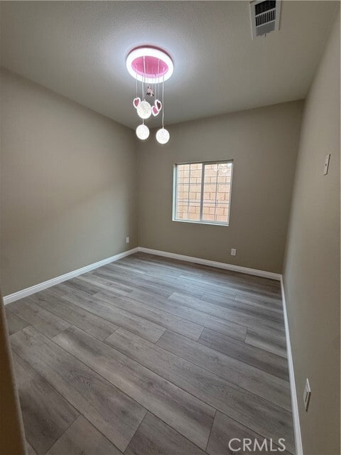 Building Photo - 7398 N Maple Ave