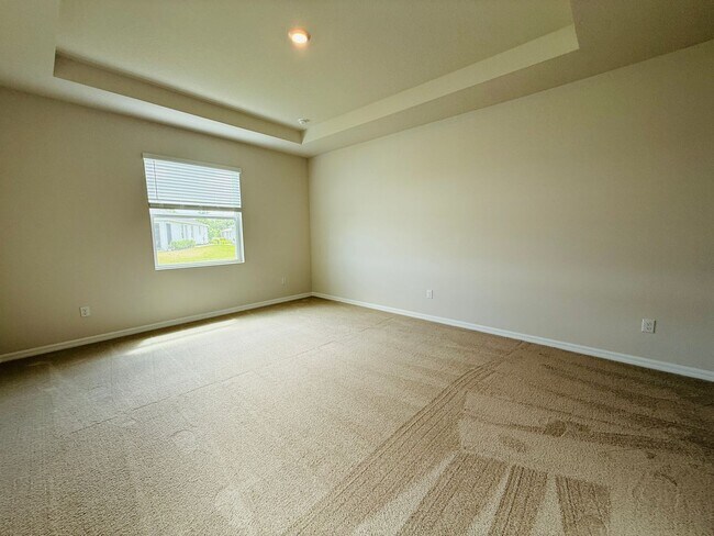 Building Photo - New built 4 bedroom 3 bath 3 car garage in Coddington Subdivision
