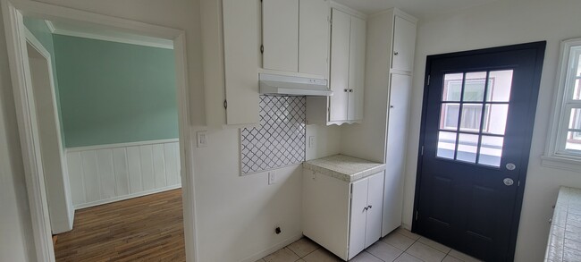 Kitchen looking out tords dining room/ balcony - 11683 Chandler Blvd