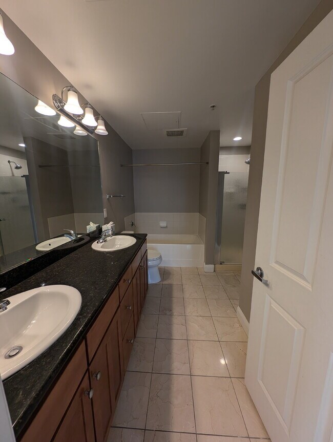 Building Photo - Chic Urban Living: Spacious 2-Bed Condo in Denver with 2 Reserved Garage Spaces!