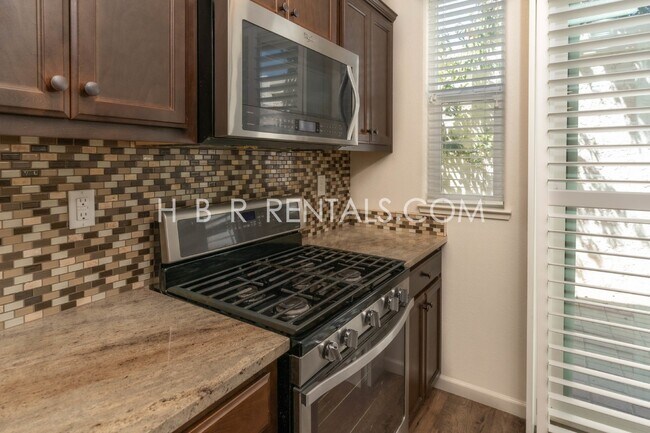 Building Photo - Spacious 4-Bedroom with Granite Finishes in Tracy – Your Dream Home Awaits!