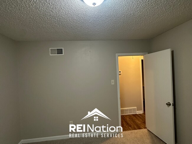 Building Photo - NEWLY RENOVATED! Massive 4BR/2BA Bartlett Stunner | Hardwoods & Fireplace!