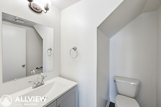 Building Photo - Fully Renovated 2 Bed Townhome with Private Patio, 2-Car Garage & Community Pool