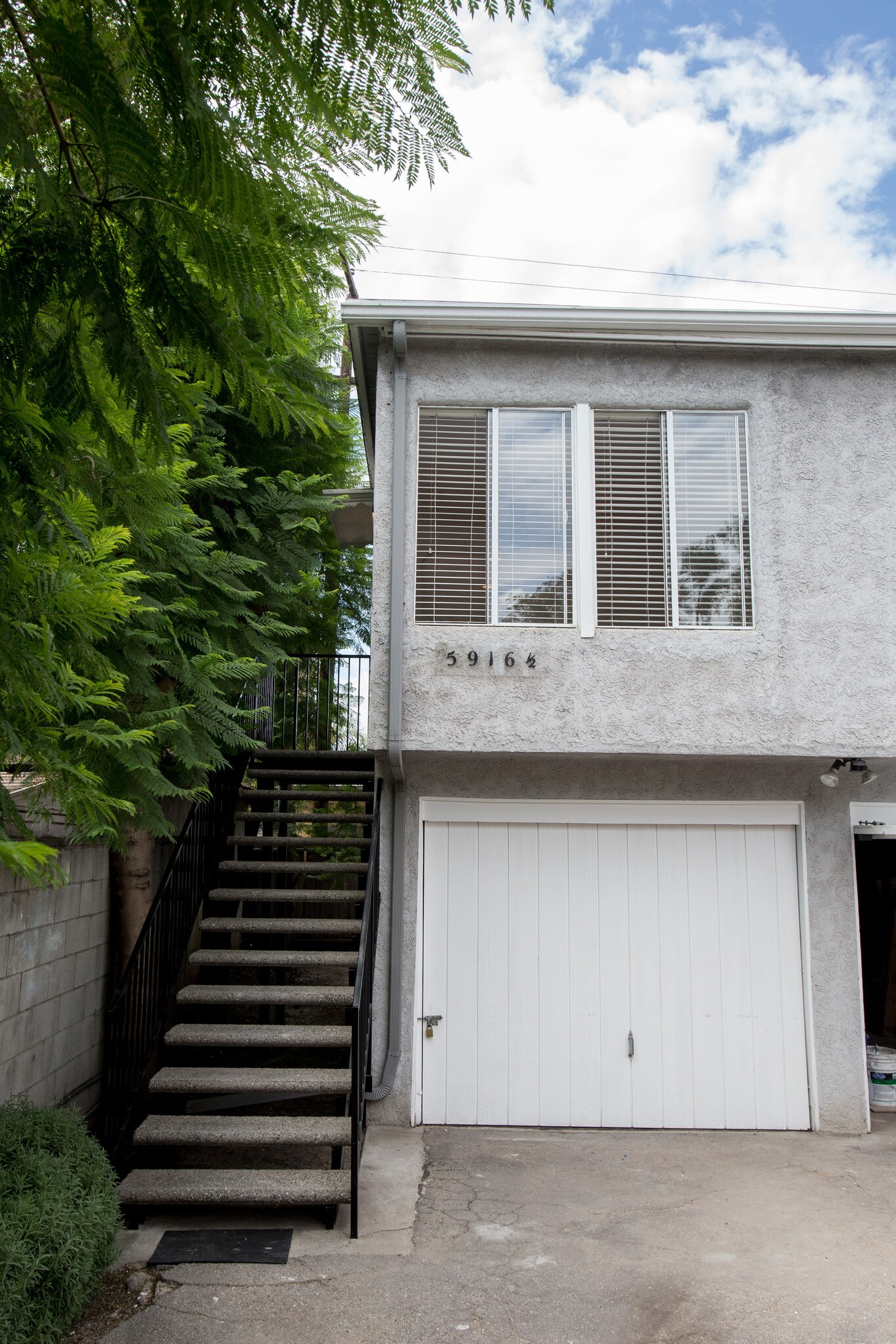 Above garage - 5916 Ernest Ave