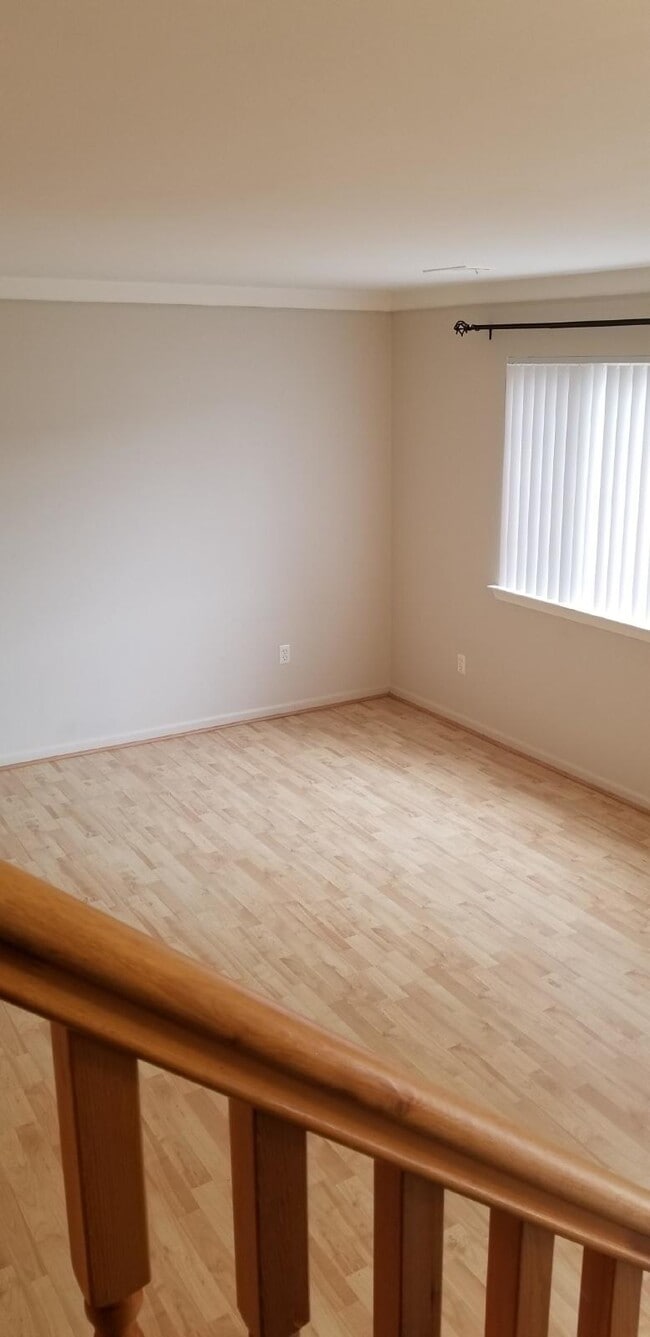 Building Photo - 2 Bedroom, 1.5 Bath Townhouse w/ Garage & Huge Master Bedroom. Full Sized Washer & Dryer In Unit.