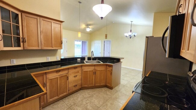 Building Photo - Ah Puck, Jordanah &amp; Tyson