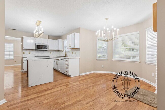 Building Photo - "Charming 4-Bedroom Retreat with Fireplace & Hardwood Floors on Michelle Drive!"