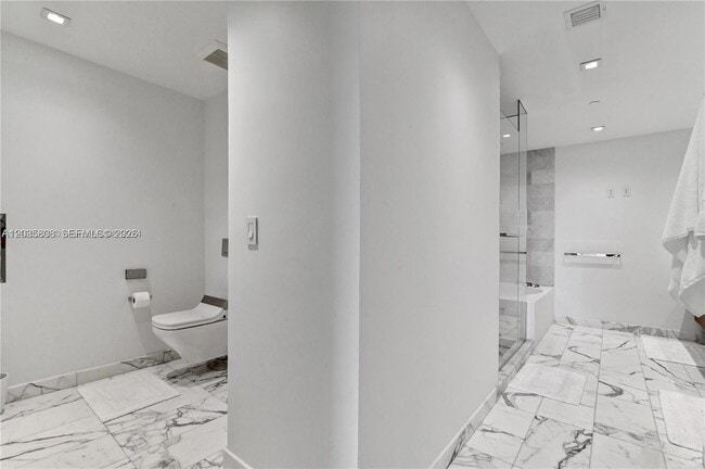 Building Photo - 10203 Collins Ave