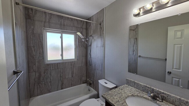 Building Photo - 4 Bedroom 2 Bath with Finished Basement and Study!