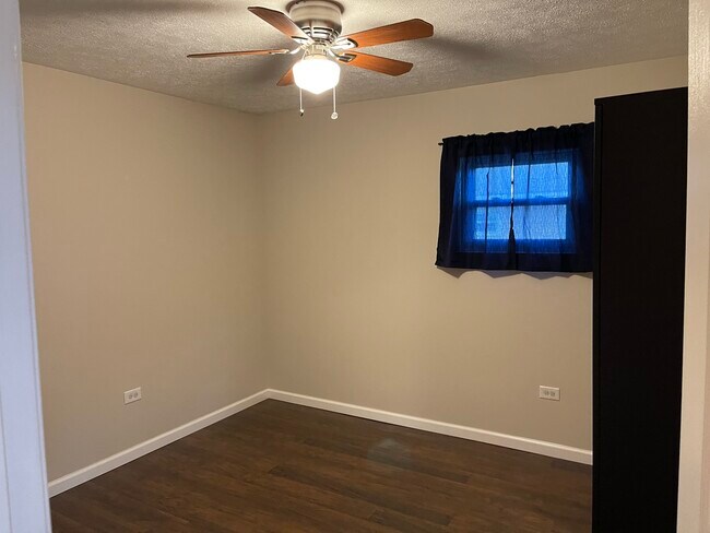 bedroom one - 517 N 9th Ave