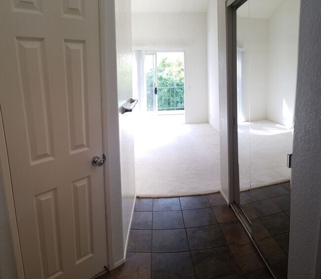 Building Photo - Bright and Airy 2-Bedroom, 2-Bathroom Condo