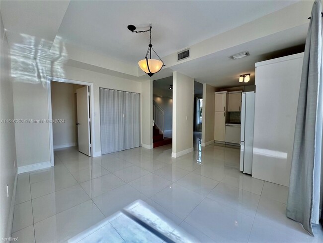 Building Photo - 3 br, 2.5 bath Condo - 8625 SW 152nd Ave A...