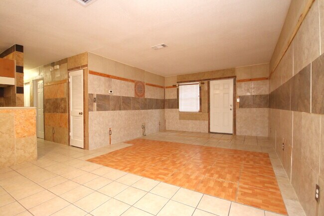 Building Photo - Updated 2BR/1BA Brick Duplex in North Pensacola with Tile Flooring Throughout, Included Utilities...