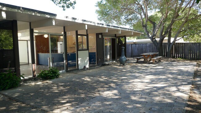 Building Photo - BEAUTIFUL UPDATED FOUR BED / TWO BATH PLUS OFFICE EICHLER HOME WITH GREAT OUTDOOR SPACE