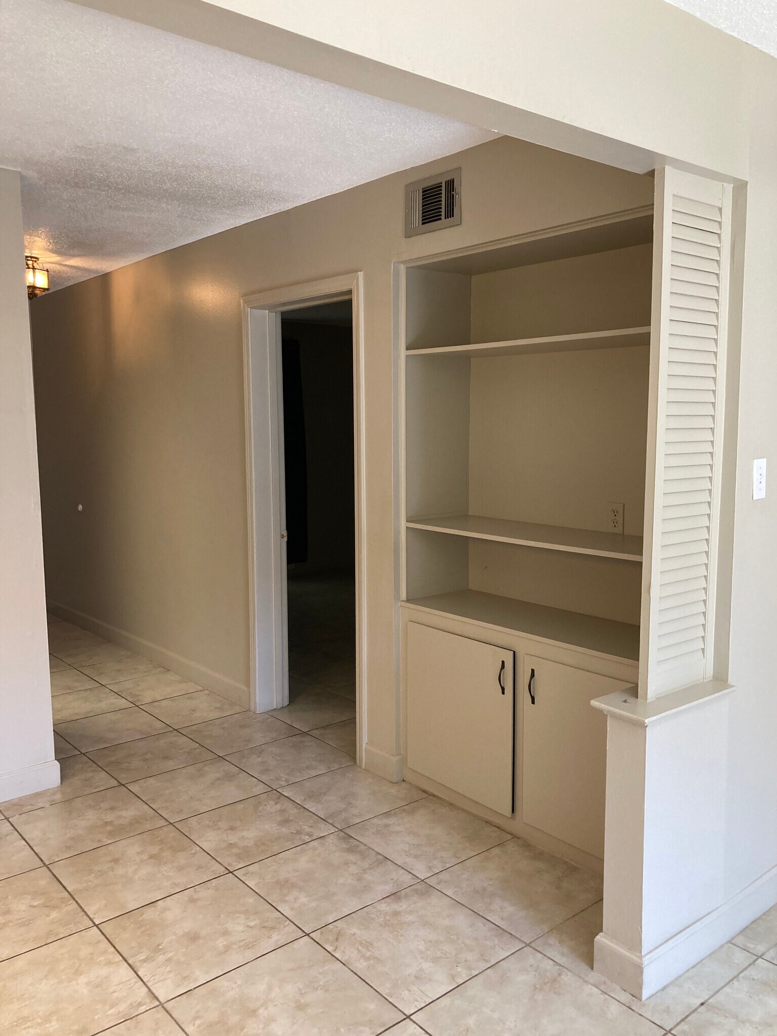 Built in shelving and storage - 3320 N Arnoult Rd