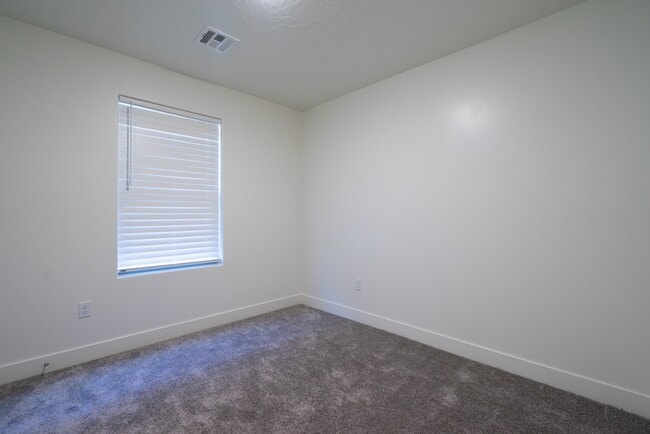 Building Photo - Modern 4-Bed Stand-Alone Home with Fenced Patio