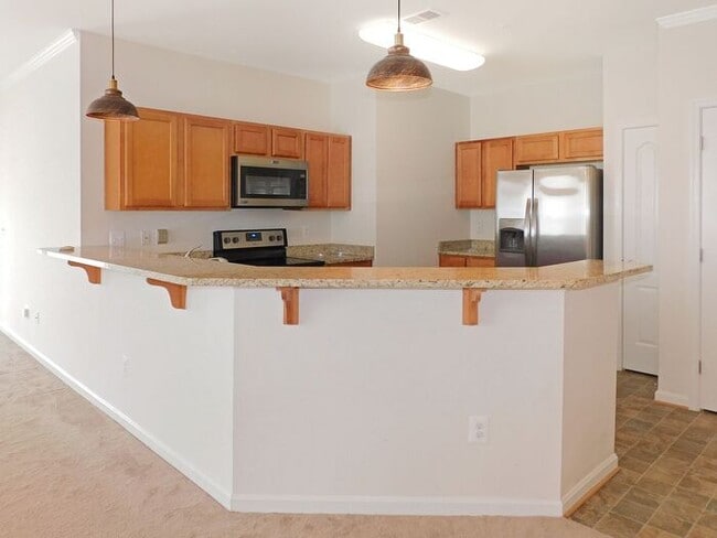 Building Photo - Pet Friendly Condo with Private Balcony and 1 Car Garage