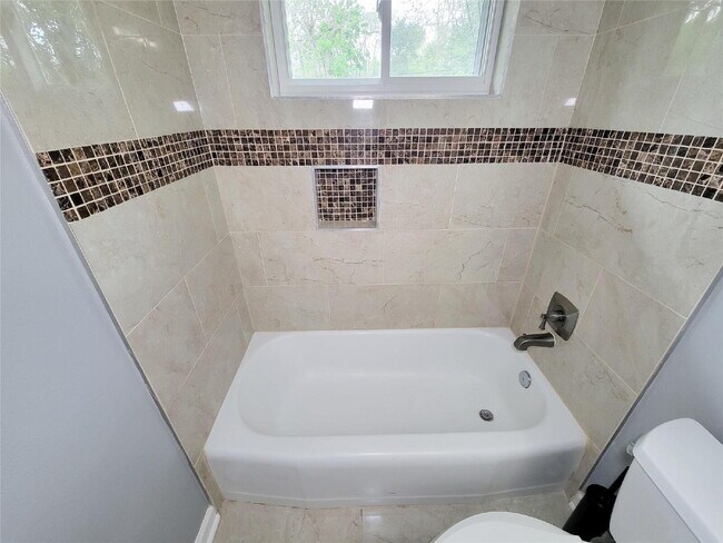 Building Photo - 3 Bed Home for Rent in Westbury 77035 with Large Fenced Yard & Deck