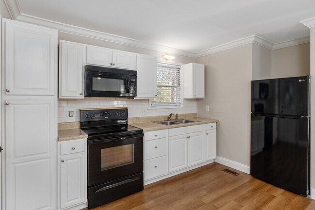 Building Photo - Beautifully updated, all-brick home locate...