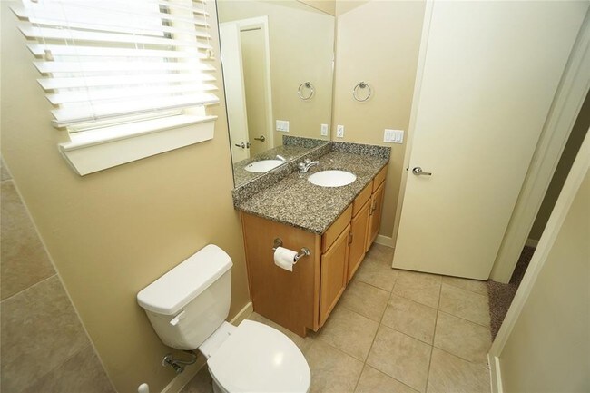 Building Photo - Elegant Gated Townhome Offering Unparallel...
