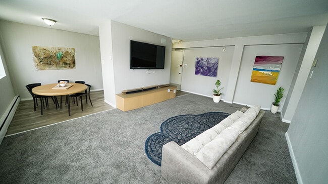 Living Room with a view into the kitchen in a 1 bedroom apartment - Brynfield Court Apartments