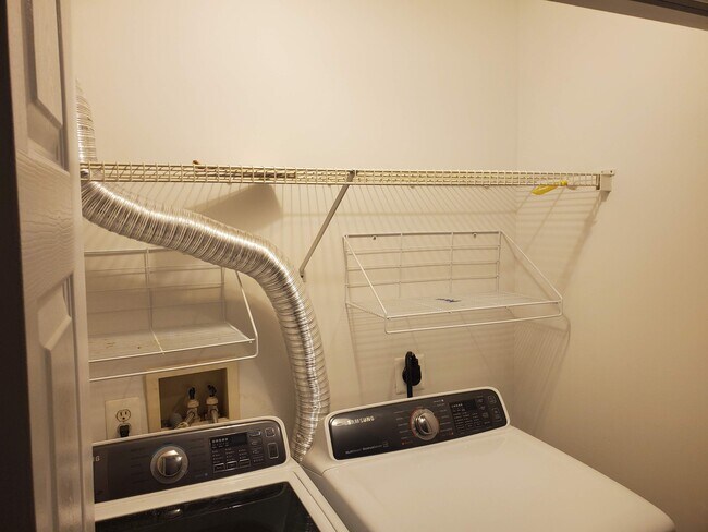Laundry upstairs hall - 5921 Founders Crossing Ct