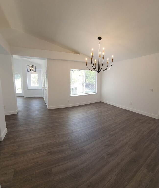 Building Photo - Gorgeous 2 bedroom newly renovated upstairs corner condo in gated community with pool & hill side...