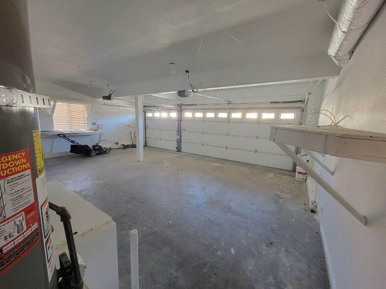 Garage - 3 cars can fit! - 28045 Magic Mountain Ln