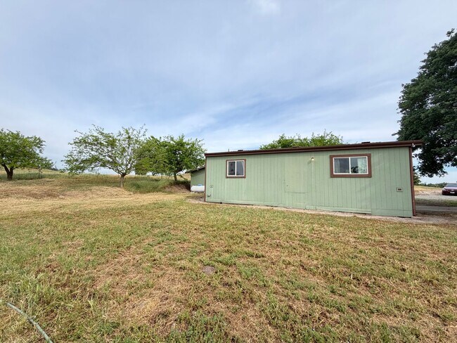 Building Photo - Secluded country home w/ 2-car garage