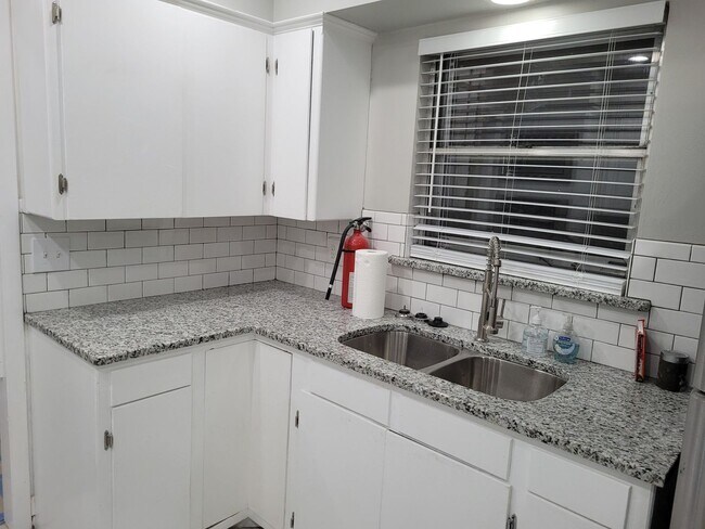 Building Photo - Remodeled 3 bedroom 2 bathroom house with 2 car garage and fenced yard