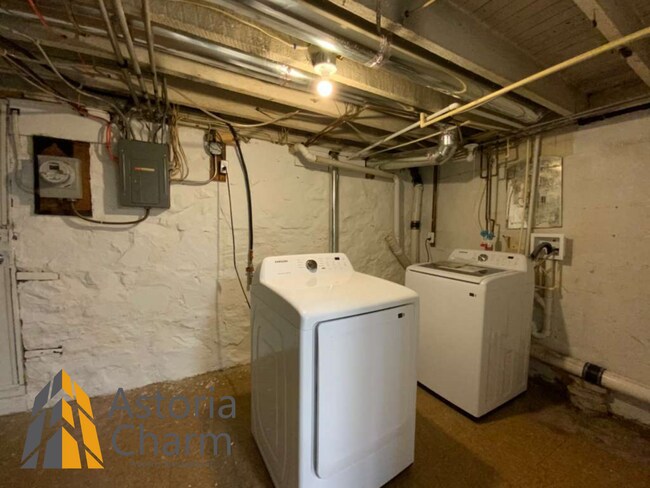 Building Photo - 2 Bed with Finished Basement, Deck off Bedroom, and Backyard