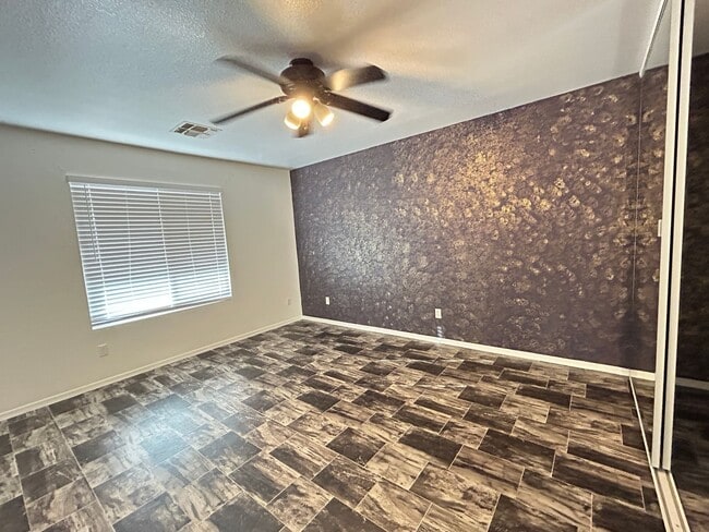 Building Photo - Unique 4 Bedroom, 2 Bath 2 Car Garage