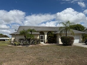 Building Photo - ANNUAL RENTAL - 4 BED / 3 BATH LAKE FRONT POOL HOME IN REGENT PARK