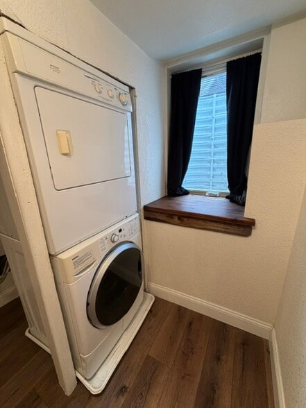 Bedroom 2-Washer and Dryer, egress window, reclaimed wood window sill - 2261 Newark st