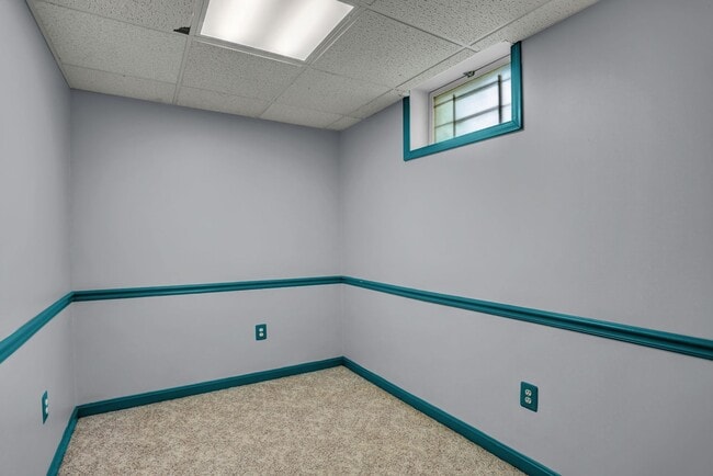 Building Photo - Spacious 4-Level Home with Deck, Workshop ...
