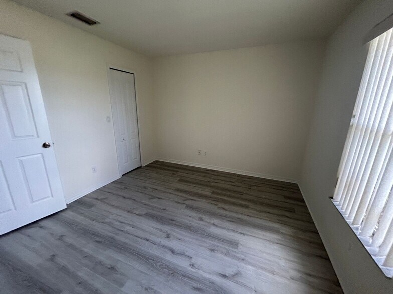 Building Photo - Nice 3/2 with newer carpet