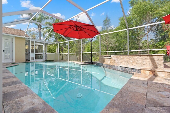 Building Photo - 9905 Woodbay Dr