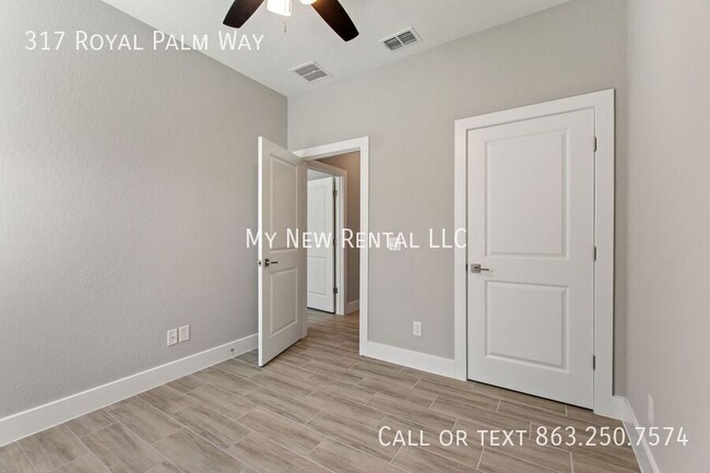 Building Photo - 317 Royal Palm Wy