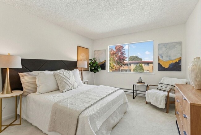 Building Photo - Modern 2-Bedroom Condo with Pool and Koi Pond Views