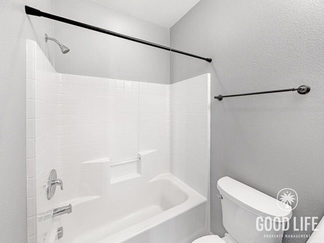 Building Photo - Elegant 3BR Residence in Exclusive Gated Community w/ AC & Garage!