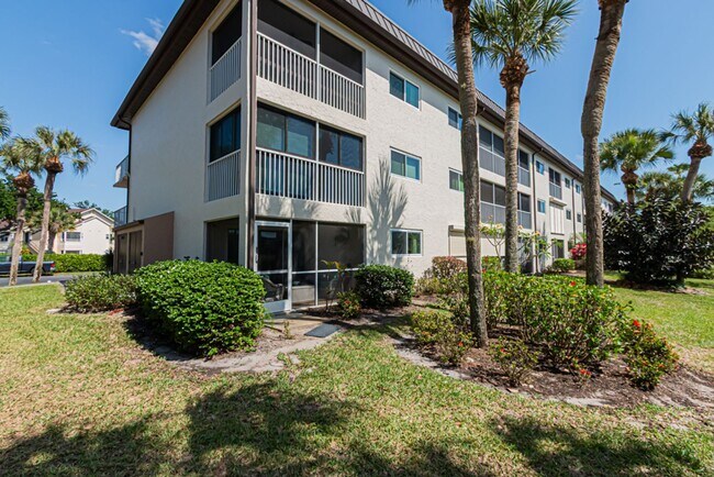 Building Photo - AVAILABLE NOW! Furnished Ground-Floor End Unit | Lake & Pool Views | Minutes to Marco Island & Do...