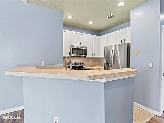 Building Photo - 12301 Kernan Forest Blvd