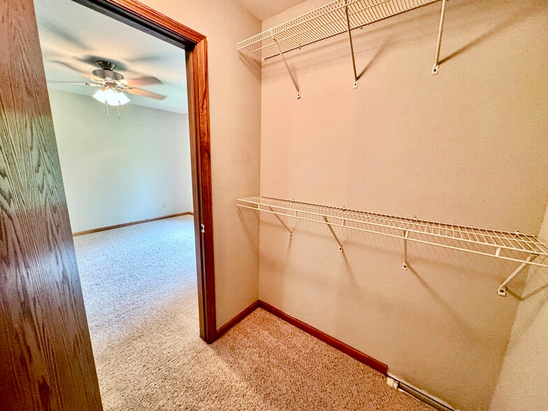 Primary Bedroom Walk-In Closet - 5807 Black Walnut Dr