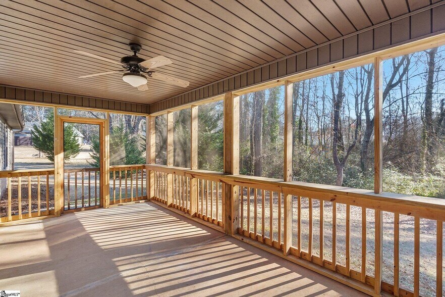 Enclosed outdoor patio with fan. - 207 Blacks Dr