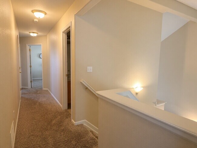 Building Photo - Lakeside 3 Bed/2.5 Bath Townhome in Gateway Community! Quiet, Scenic Living in The Heart Of Denver!