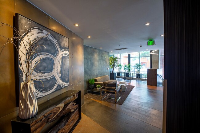 Building Photo - Modern Condo Retreat in the Vibrant M2i Co...