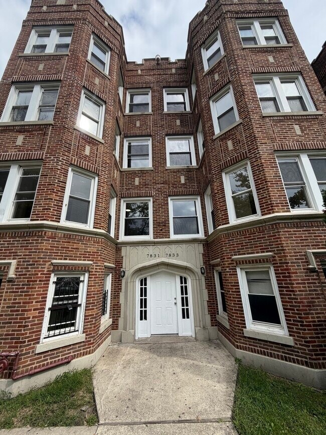 Building Photo - 7833 S Colfax Ave