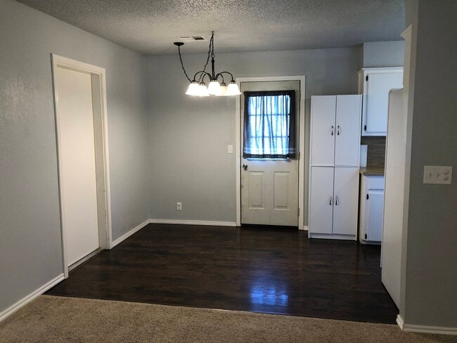 Dining Room, Backdoor, Door to Laundry Room - 254 Hickory Stick Ln